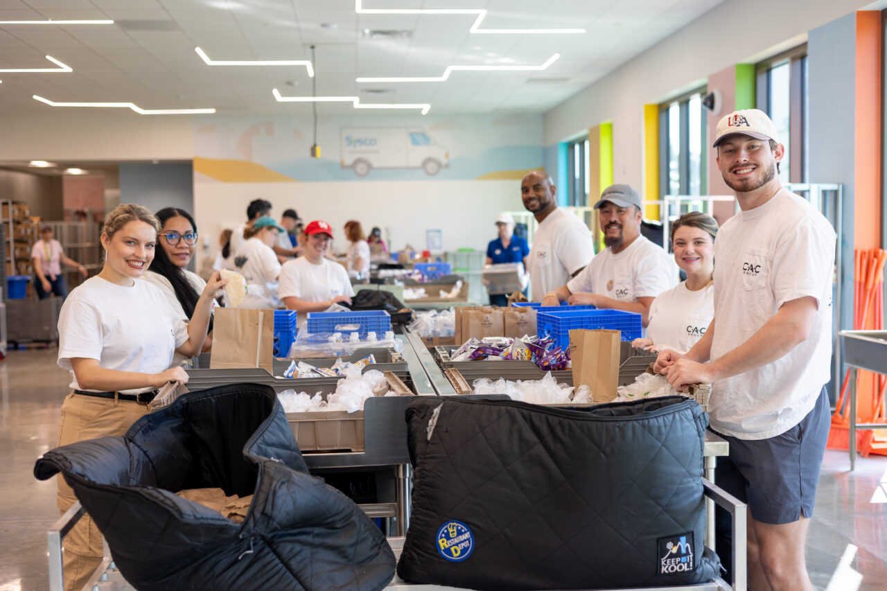 Volunteers packing food bags